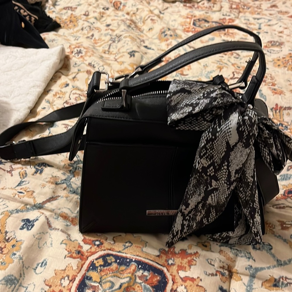 Small Steve Madden cross body bag.